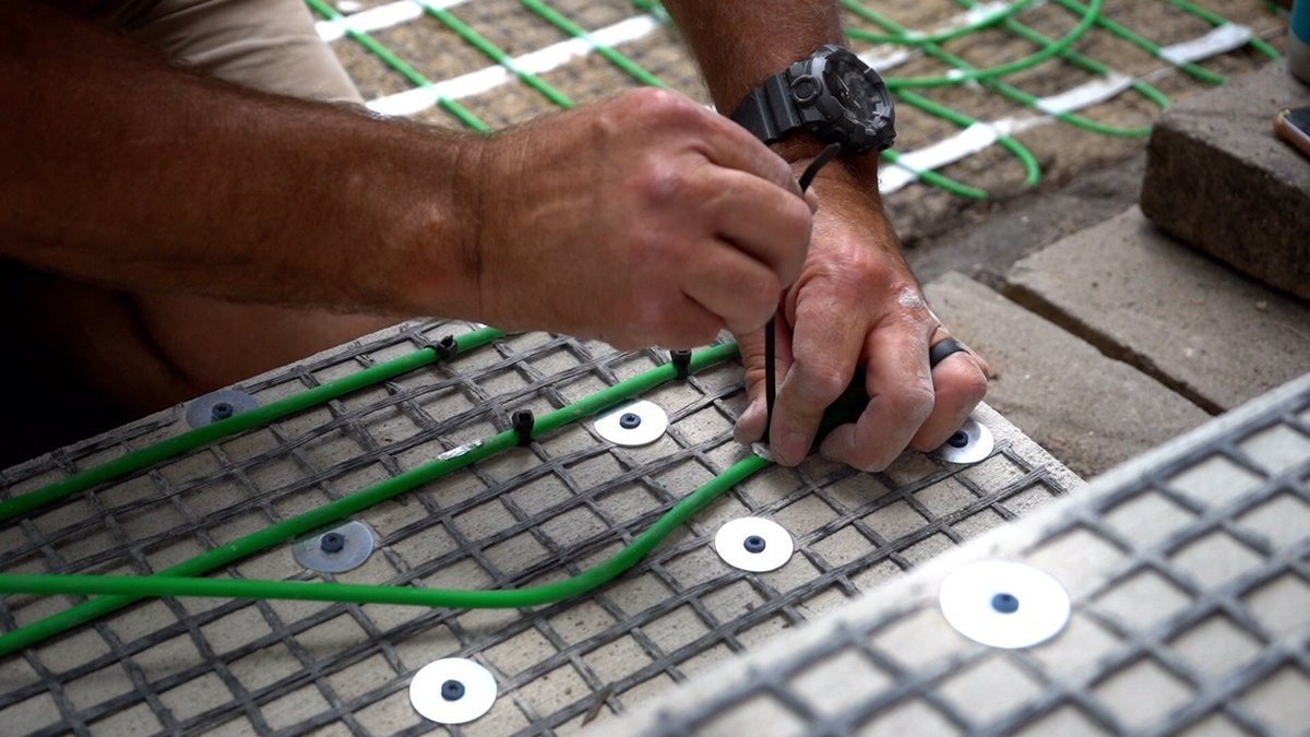 securing snow melt cable to geogrid EVANSTON, IL