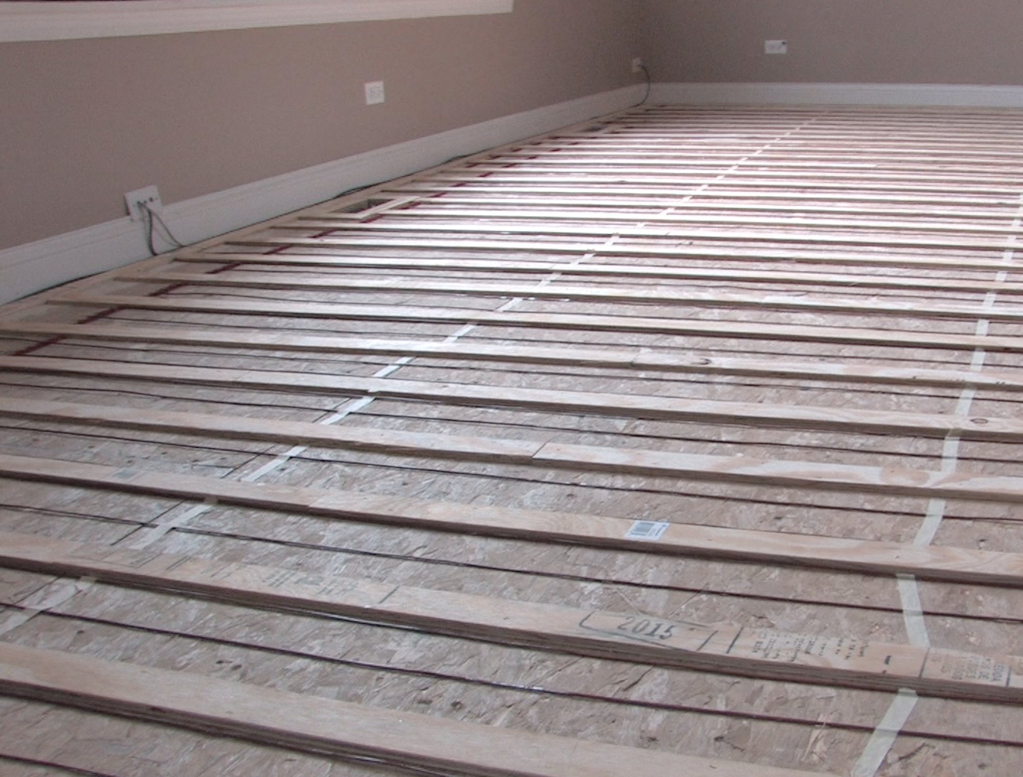 Sleeper with cable for installing radiant heat under hardwood flooring LAKE ZURICH, IL