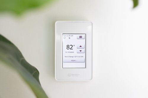 heated bathroom floor with thermostat installed (4)