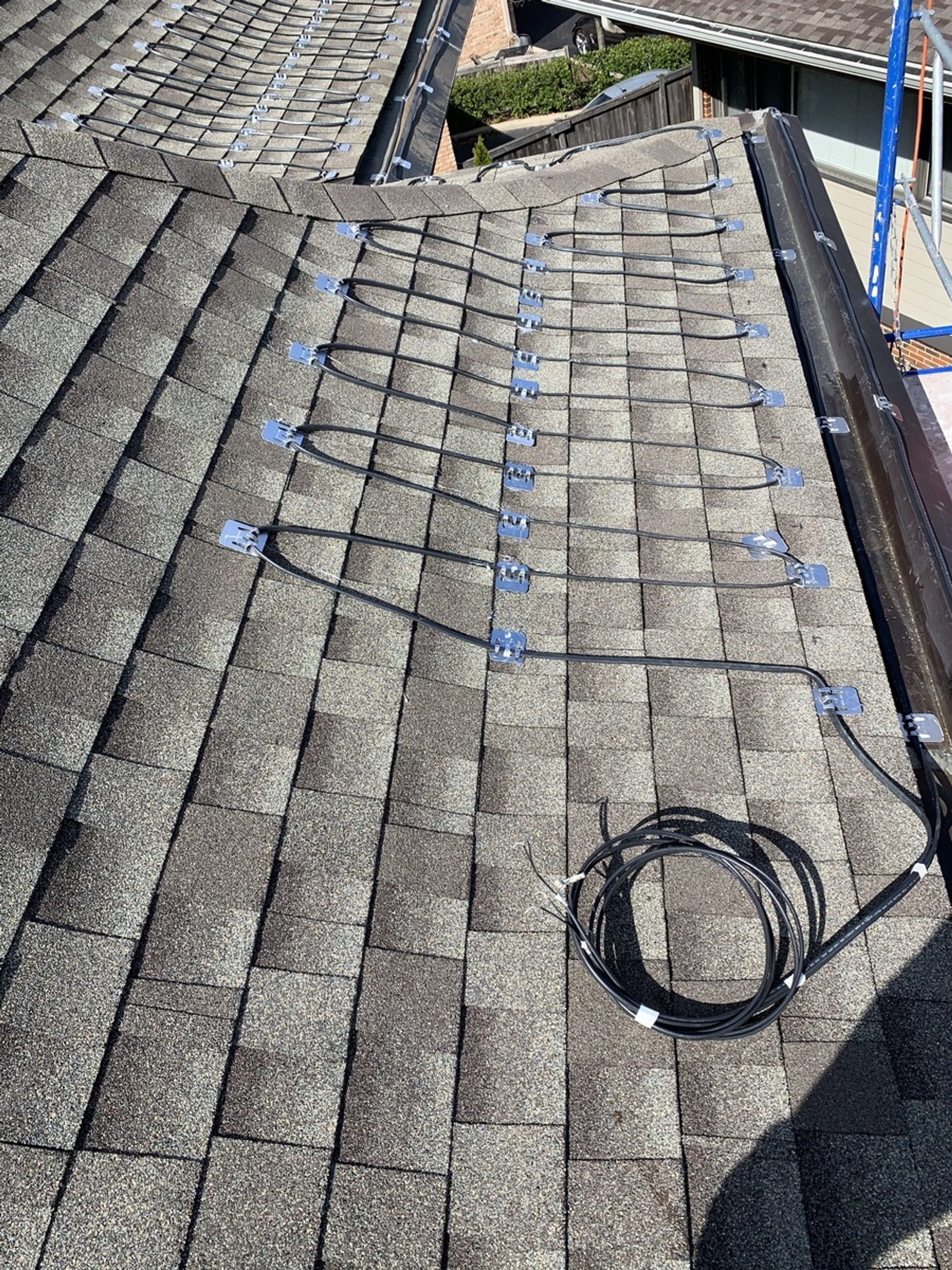 SmartInstall for Roof & Gutter System for Lake Bluff Village Hall cable run