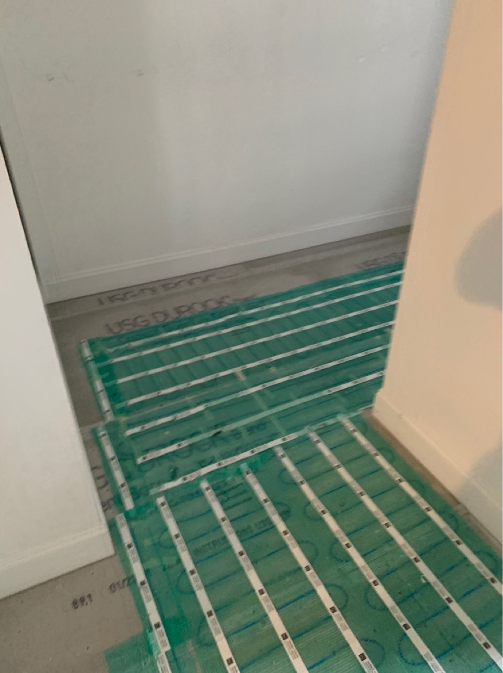 SmartInstall of Floor Heating for a Master Bathroom cut and turn with tempzone flex roll CARY, IL