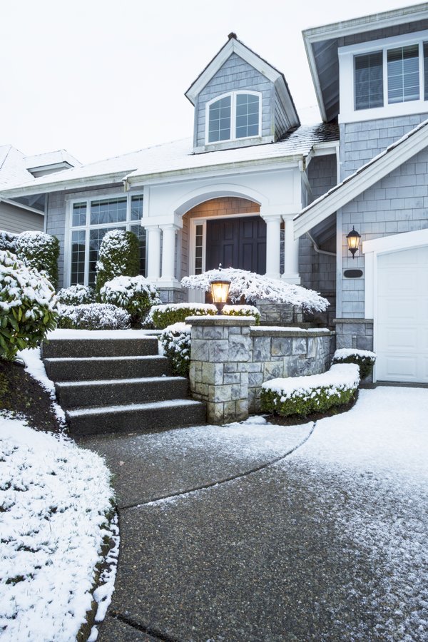 Snow dusting on home driveway