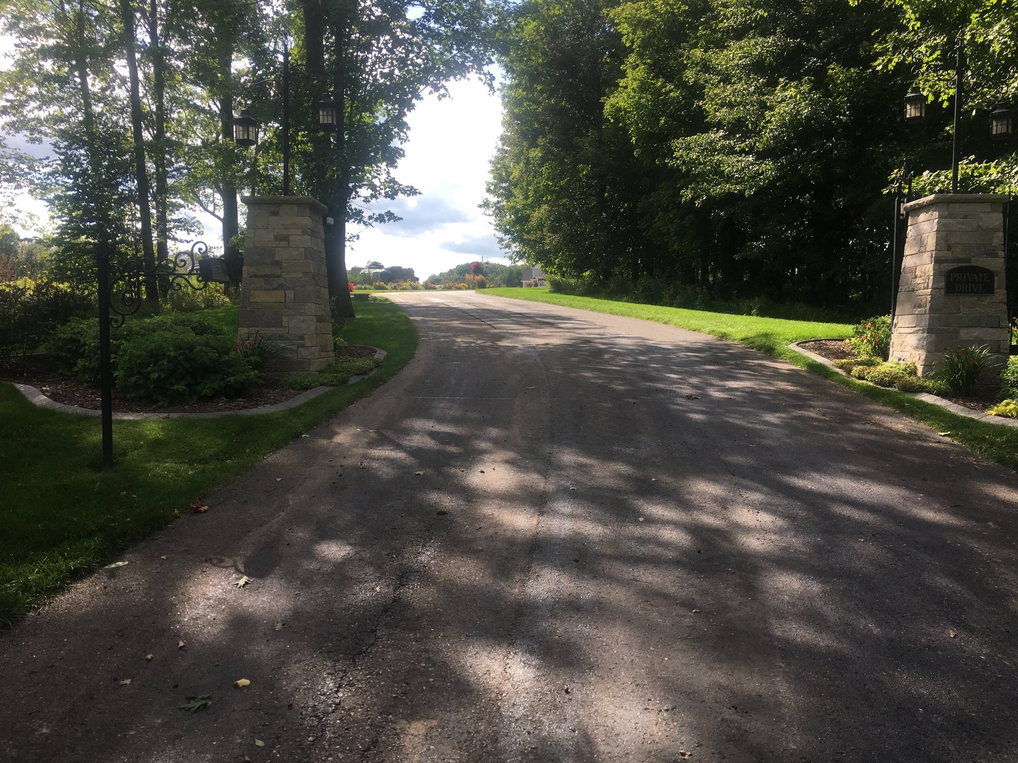 Snow Melt Retrofit for Asphalt Driveway Tire Tracks completed
