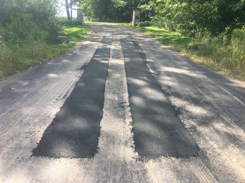Snow Melt Retrofit for Asphalt Driveway Tire Tracks covered