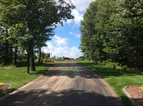 Snow Melt Retrofit for Asphalt Driveway Tire Tracks Wide View