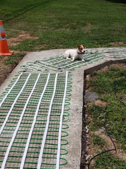 Snow Melt walkway install with sophie the dog