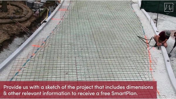 Snow Melting Cables Embedded in Sand Under Pavers for a Heated Driveway