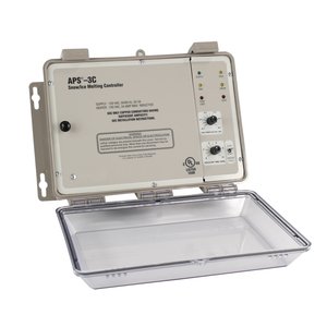 APS-3C snow melting controller in a weatherproof beige enclosure with an open protective cover, indicator lights, and adjustable control dials.