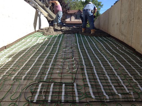 Snow Melting Install for Heated Concrete Driveway pouring concrete after mats are installed