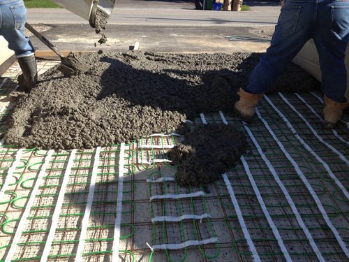 Snow Melting Install for Heated Concrete Driveway concrete layer going on top