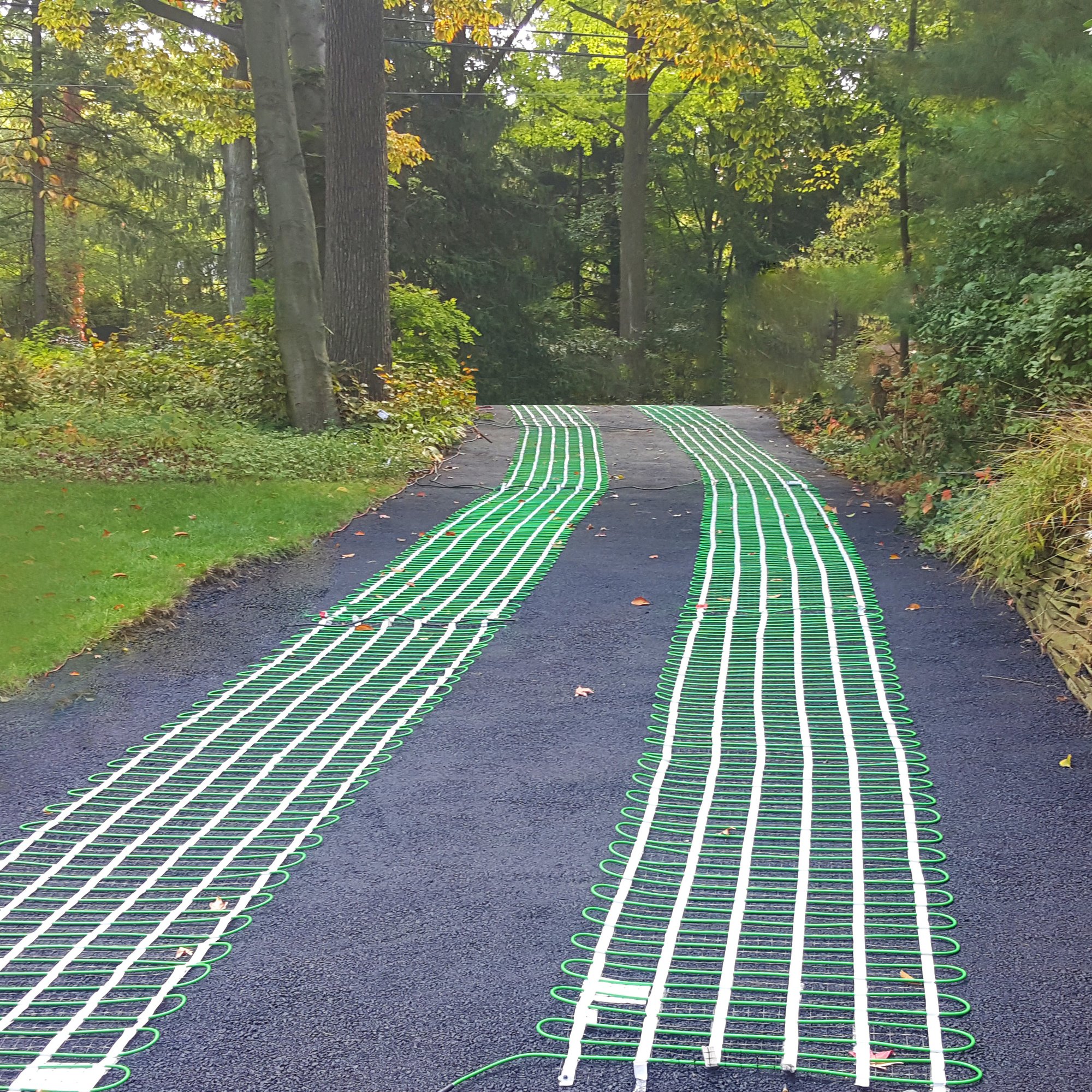 Snow melting mats tire tracks on driveway MAHWAH, NJ