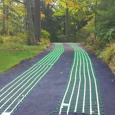 Snow melting mats tire tracks on driveway MAHWAH, NJ