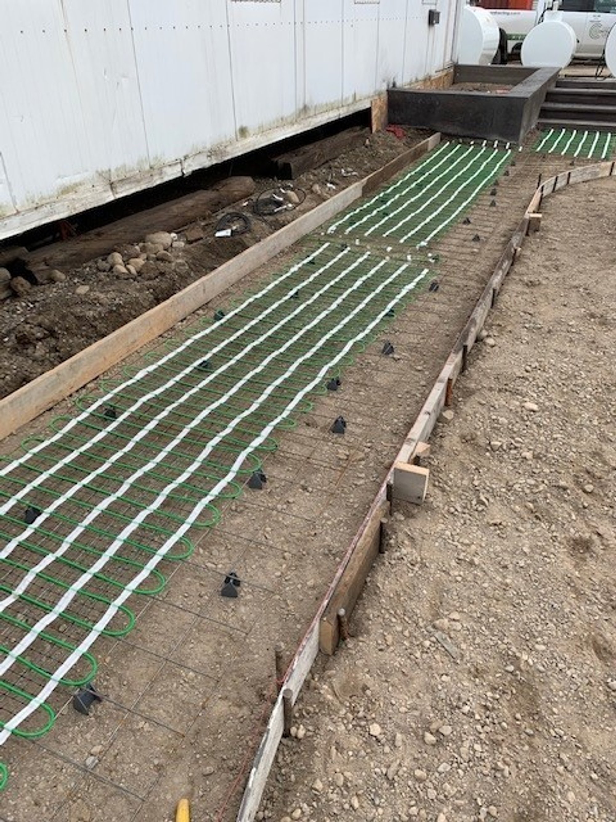Snow Melting system for walkway with pavers system installed