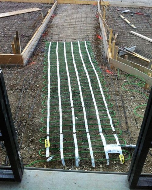 Snow melting system installation  for restaurant entrance