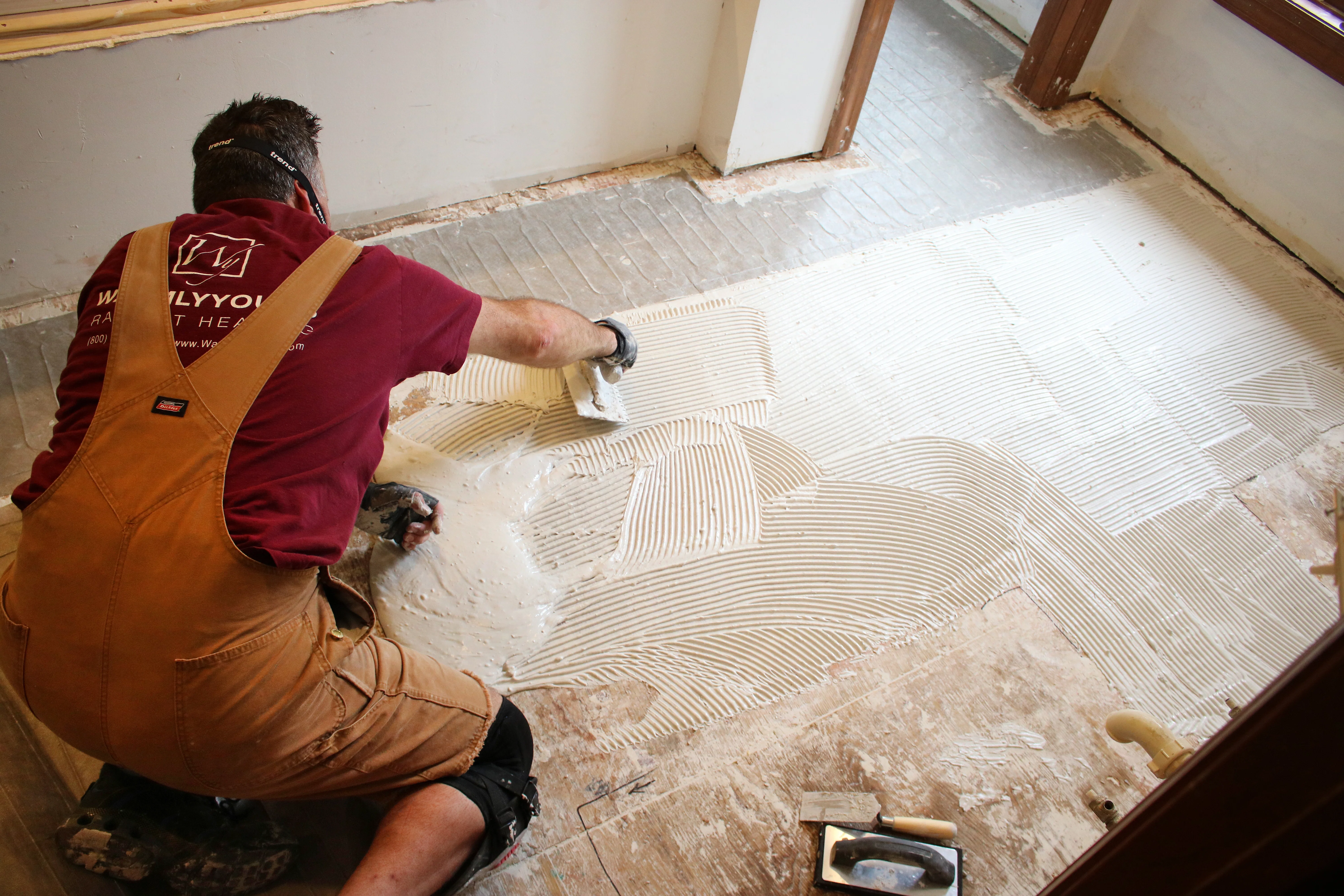 Spreading thinset for floor heating installation Installer Certification Program