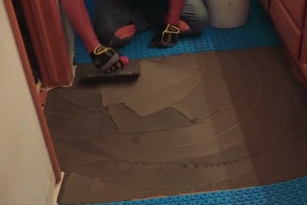 Spreading thinset under Prodeso