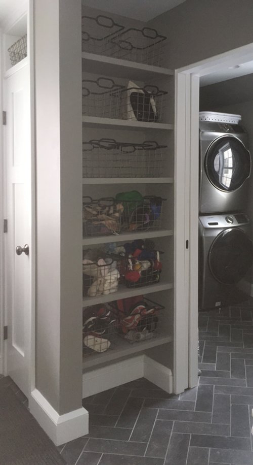 Storage for mudroom entryway with heated tile floors