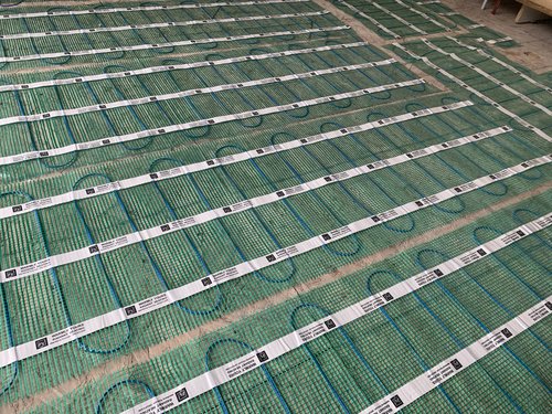 TempZone Flex Roll Installation for Tile Floor in a Kitchen closeup of heating mat