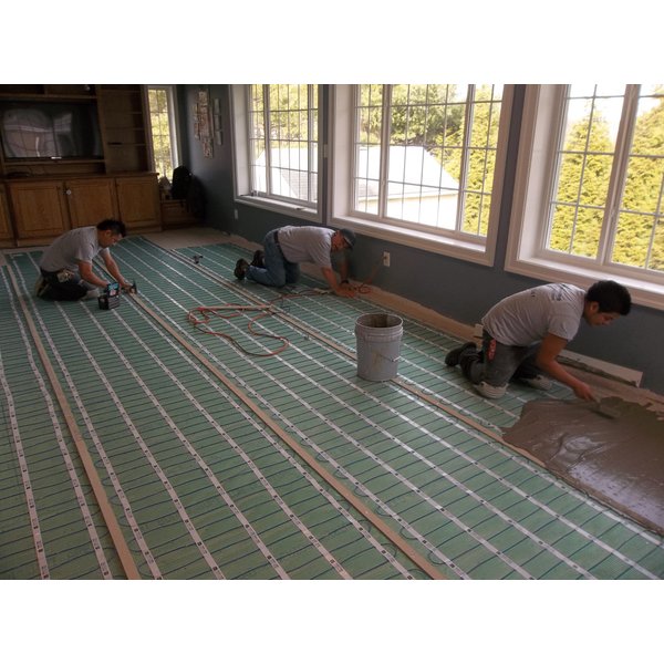TempZone Flex Rolls being installed under thinset for family room
