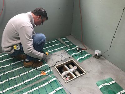 Stop Dreading Your Bathroom Floor: Warmth Meets Luxury in Northport