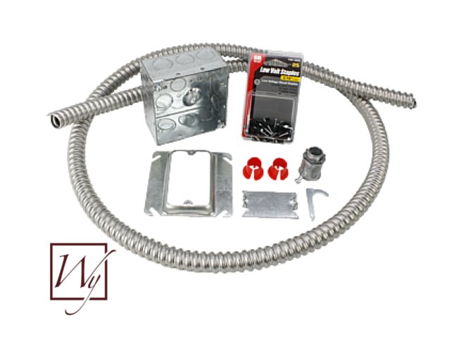 An electrical rough-in installation kit for radiant floor heating, featuring armored cable, a junction box, mud ring, and Gardner Bender staples.
