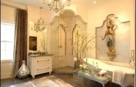 A luxurious master bathroom featuring dark tile flooring with a concealed TempZone electric radiant floor heating system.