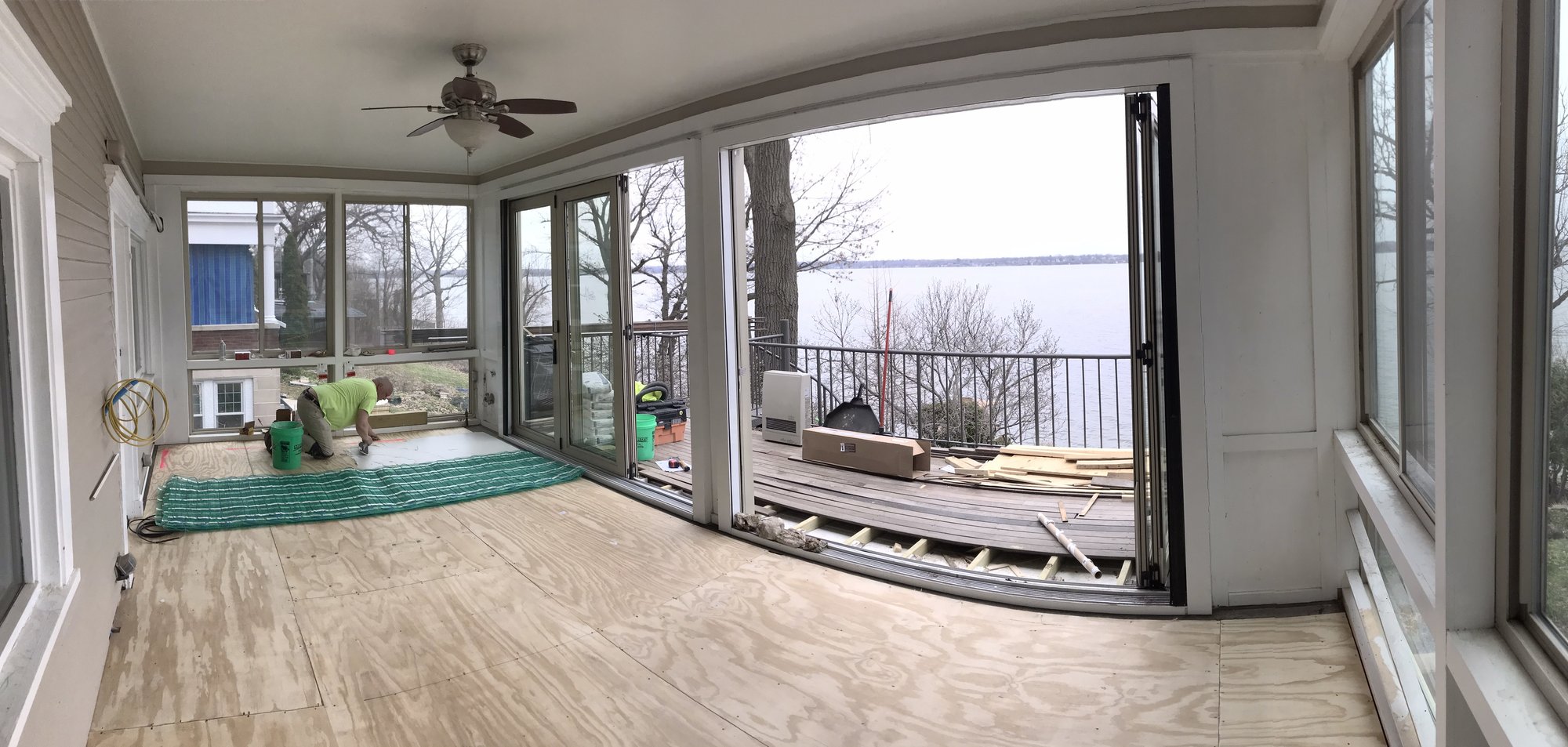 Three season porch sunroom with heated tile floors wide angle shot MADISON, WI