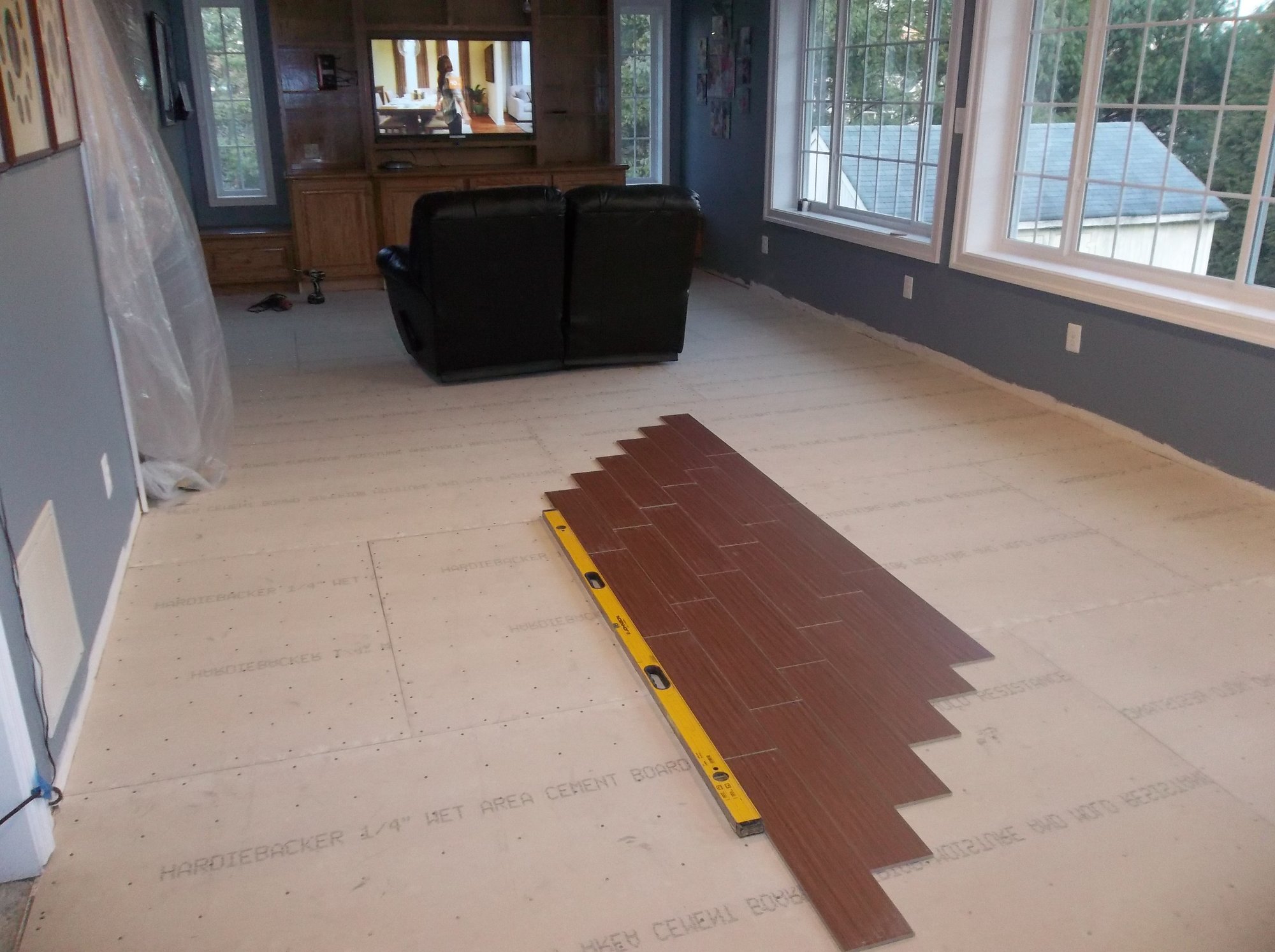 Tile floor installed over cement board in family room