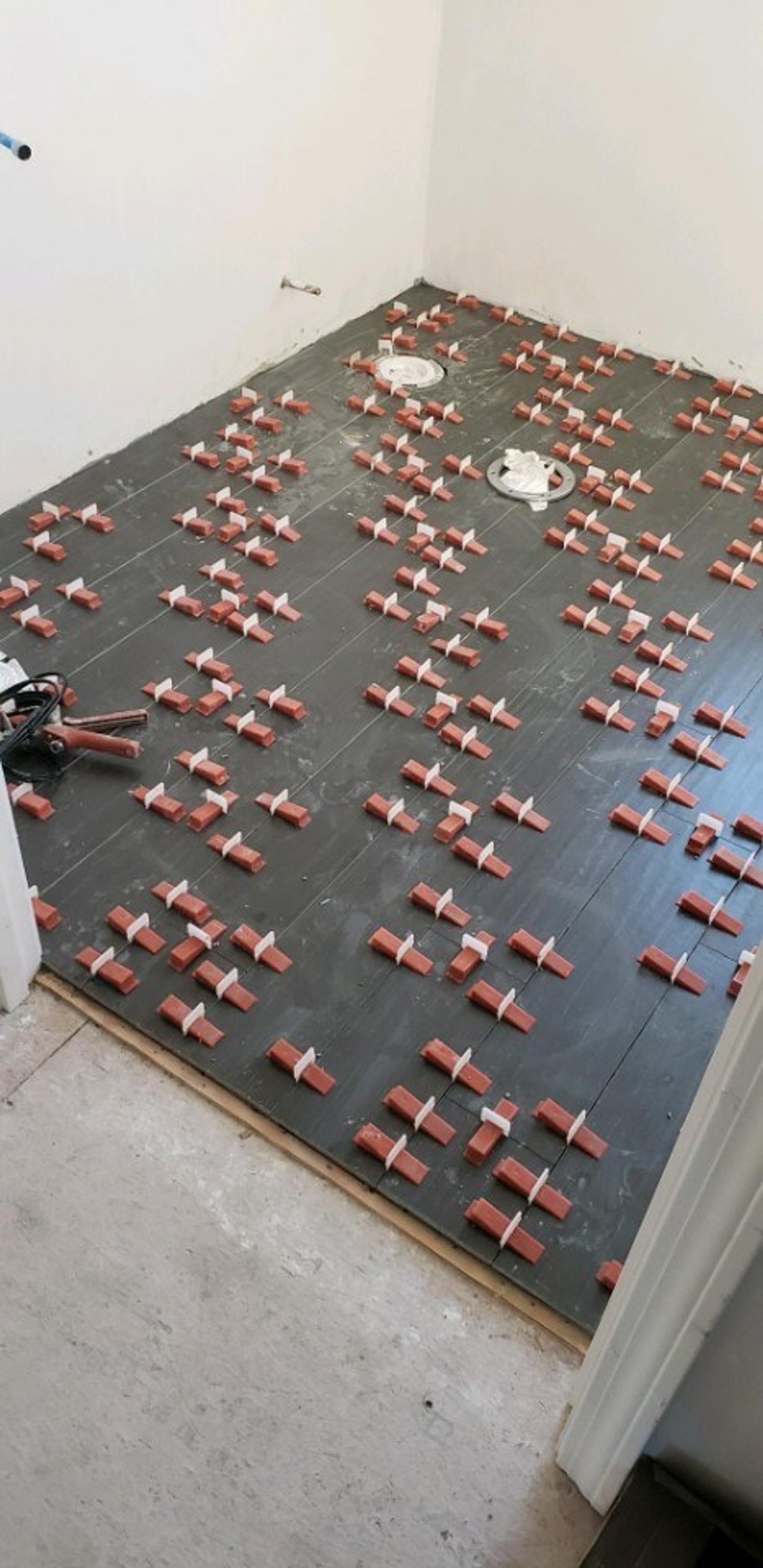 Tile installation for new bathroom with radiant floor heating PROVIDENCE, RI