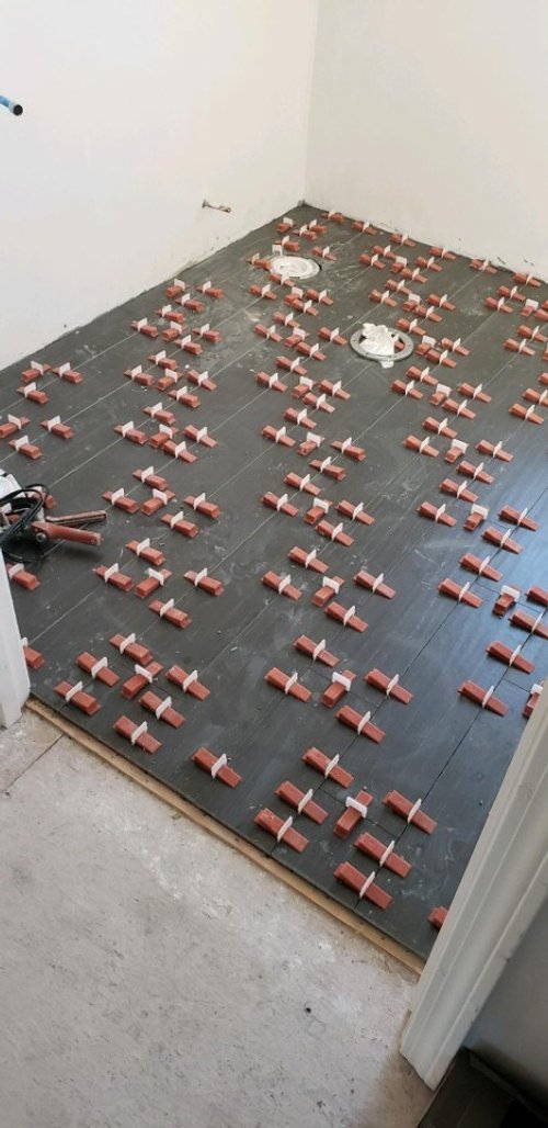 Tile installation for new bathroom with radiant floor heating PROVIDENCE, RI