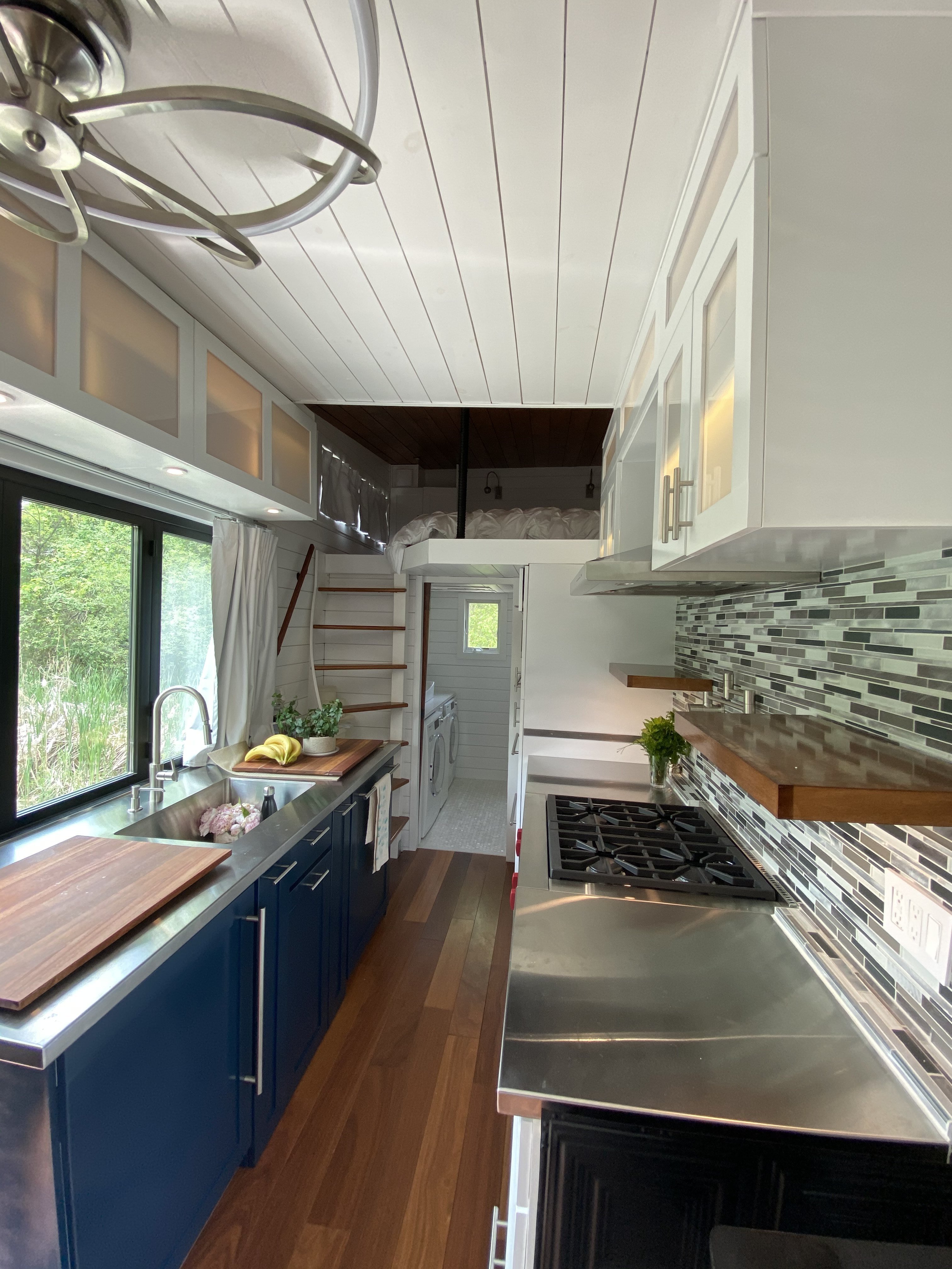 Tiny Living Living Large galley kitchen and bedroom loft