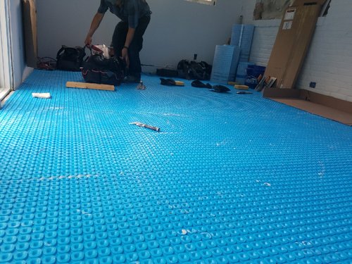 Uncoupling membrane installation for recreation room prodeso layer ALEXANDRIA, VA