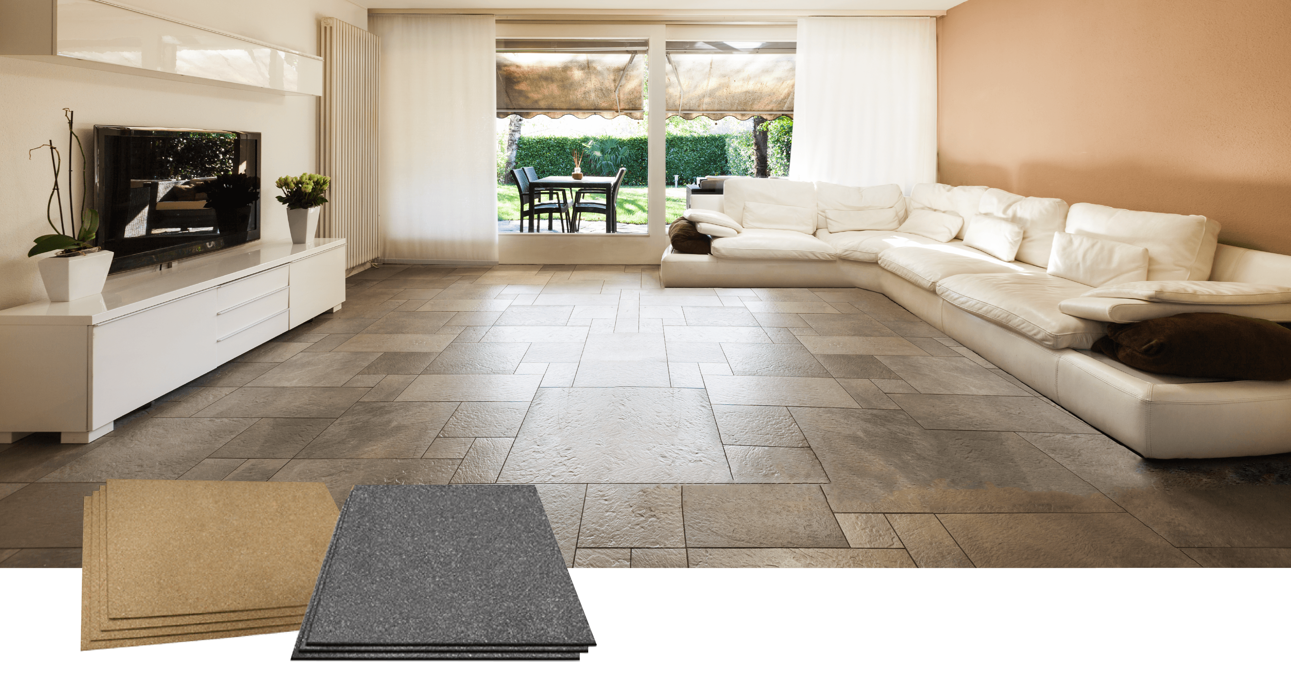 Stacks of tan cork and dark grey synthetic underlayment sheets positioned in a modern living room with tiled flooring.