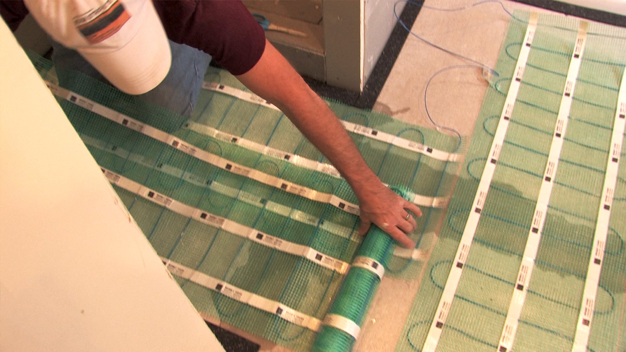 Unrolling Floor Heating Mat for Installation