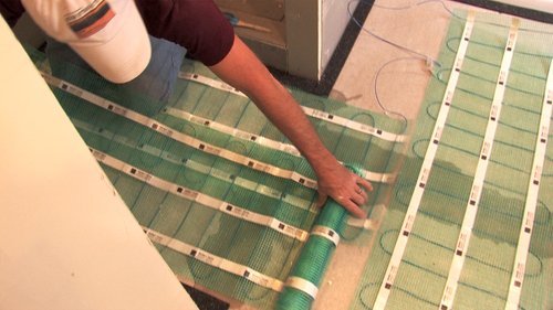 Unrolling Floor Heating Mat for Installation