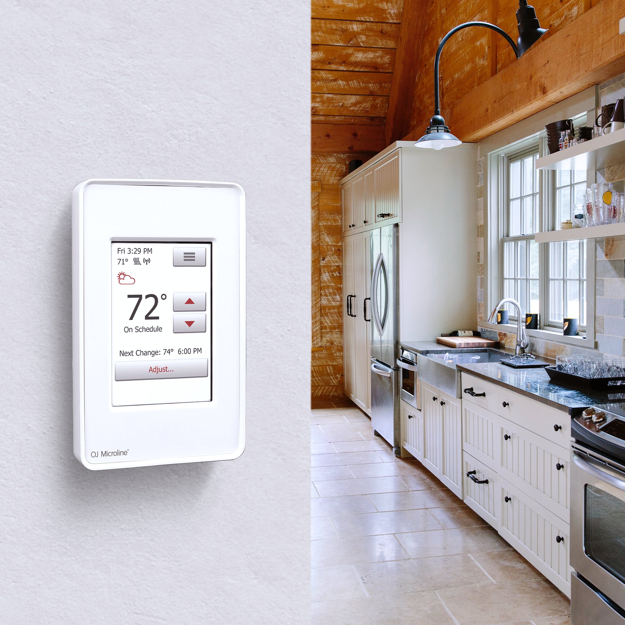 An nSpire Touch WiFi programmable thermostat mounted on a wall, displaying temperature settings for an electric radiant floor heating system.