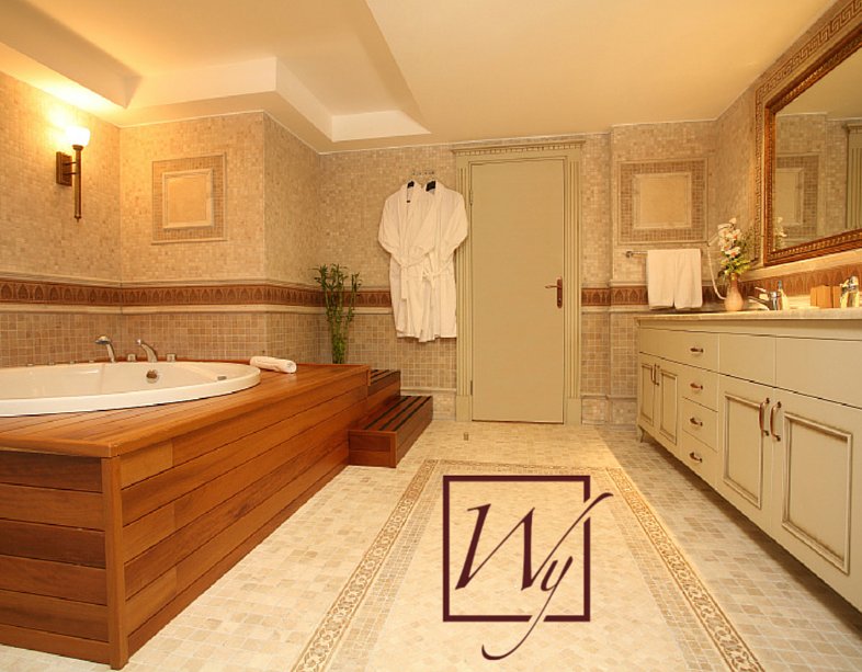 Warm towels and bathrobes lend a spa feel to the bathroom