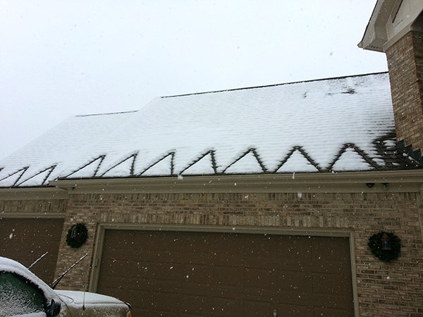 Roof deicing keeping the recovery home entrance clear