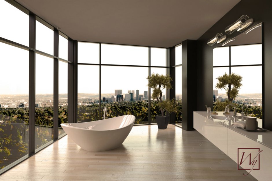 A modern bathroom with electric radiant floor heating installed beneath light wood-look tile flooring near a freestanding soaking tub.