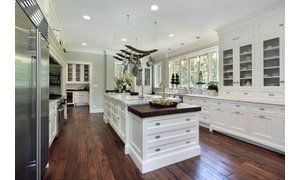 White Kitchen with Dark Hardwood