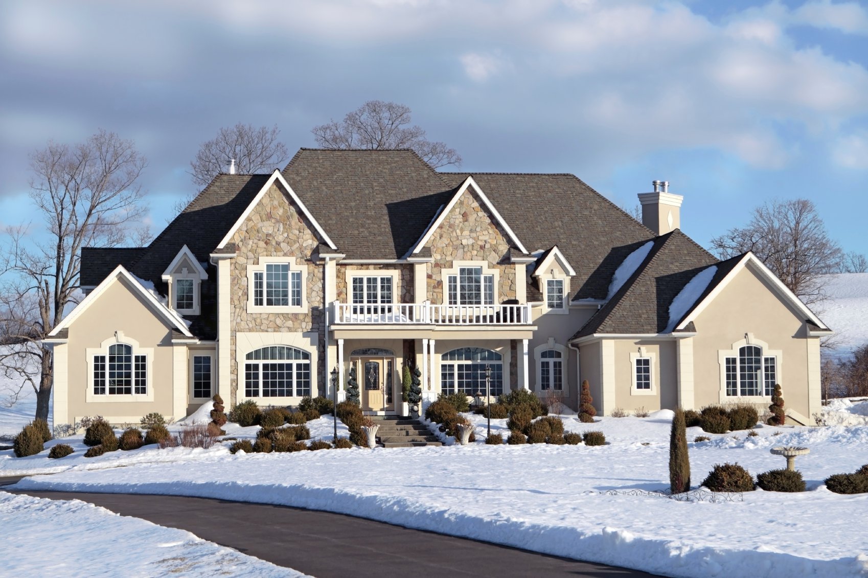 Winter Home with Melted Driveway
