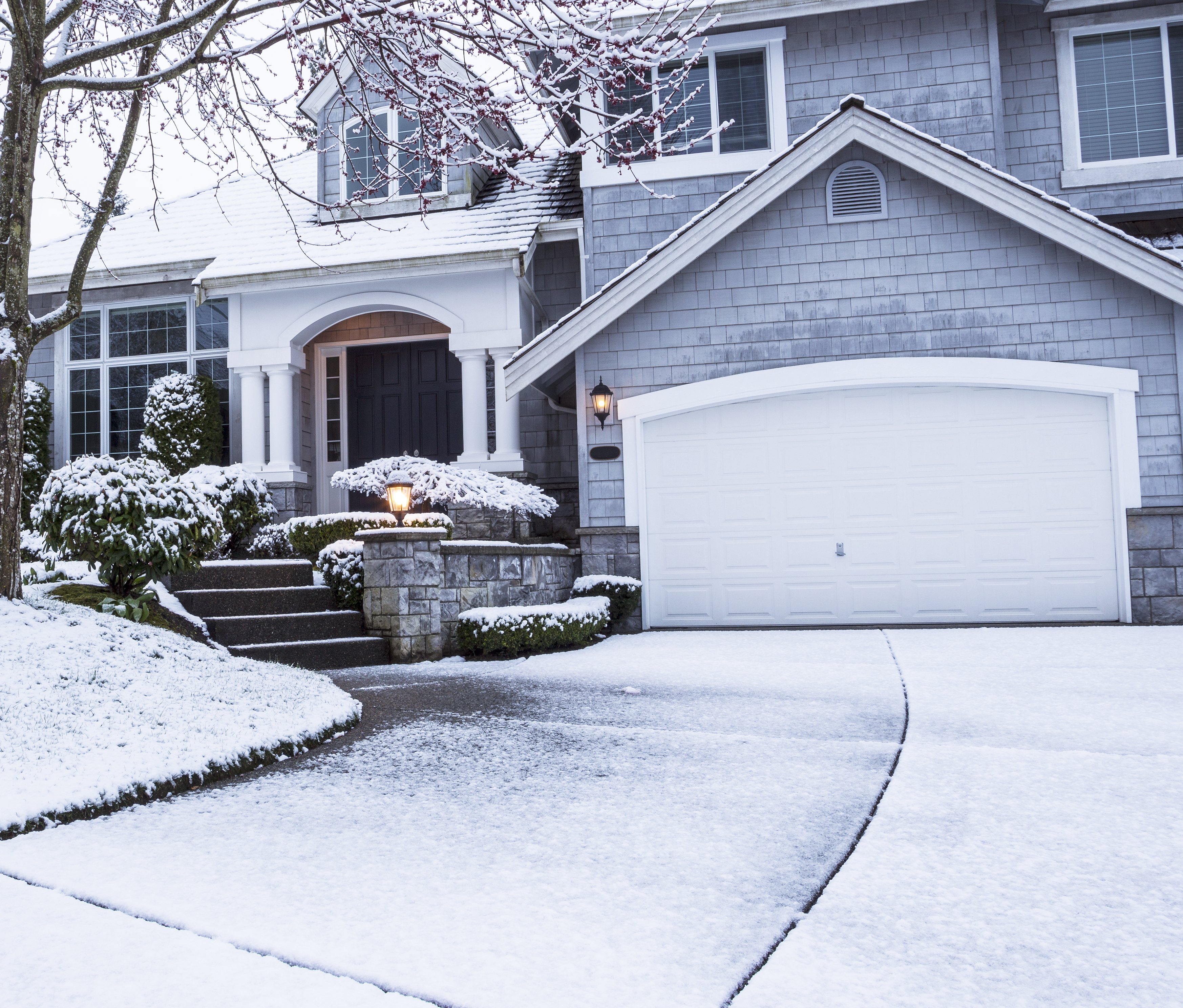 Winter house showing close up of garage