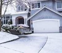 Winter house showing close up of garage