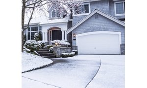 Winter house showing close up of garage