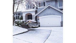 Winter house showing close up of garage