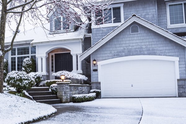Winter house showing close up of garage