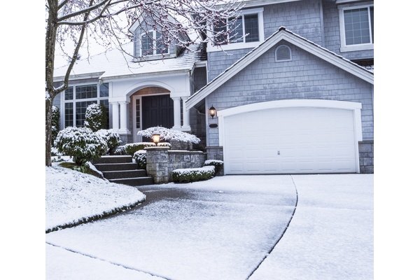 Winter house showing close up of garage
