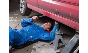 Working On Car In Garage