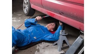 Working On Car In Garage