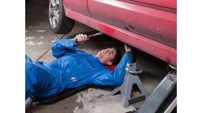 Working On Car In Garage